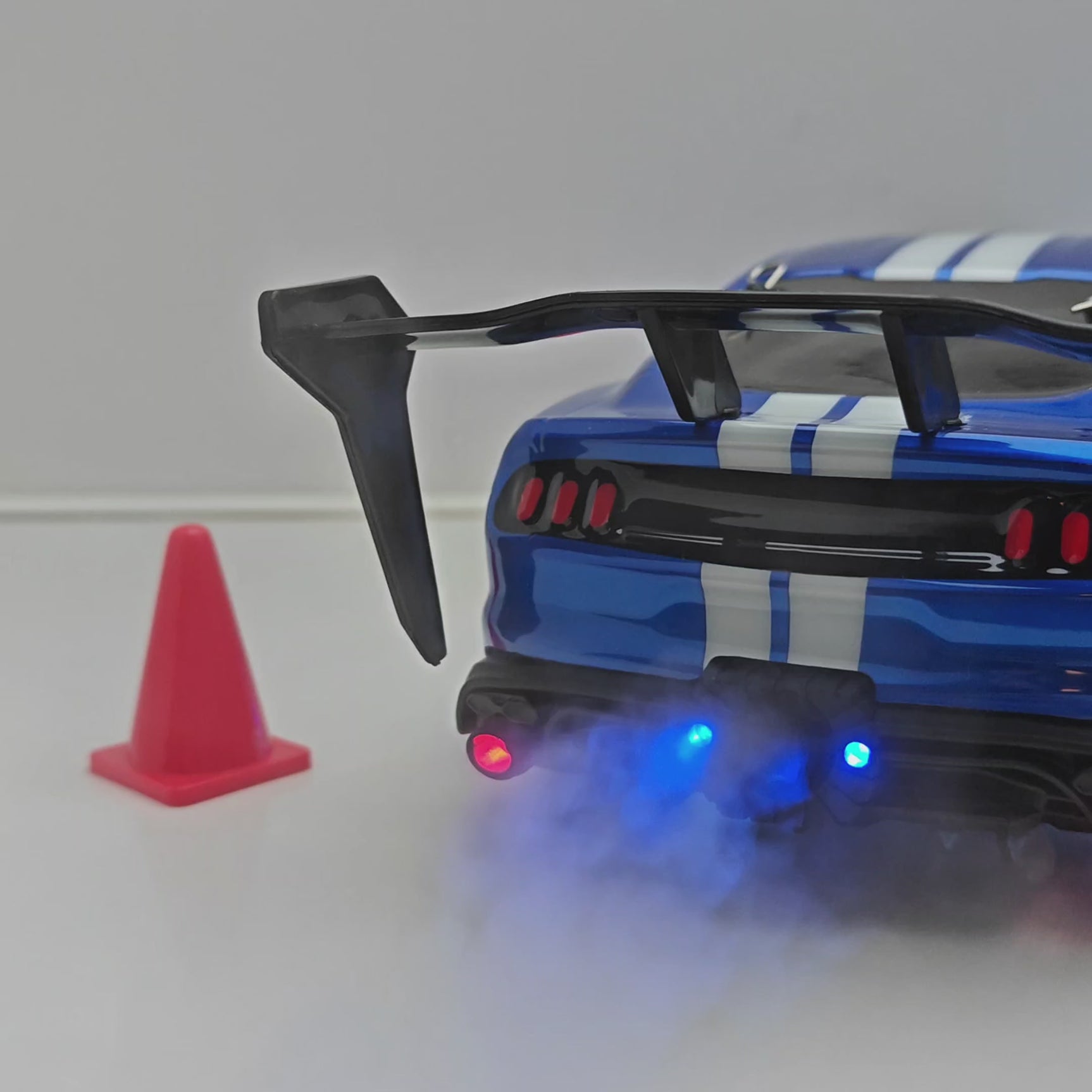 RC Drift Car PROs spraying smoke from exhausts.